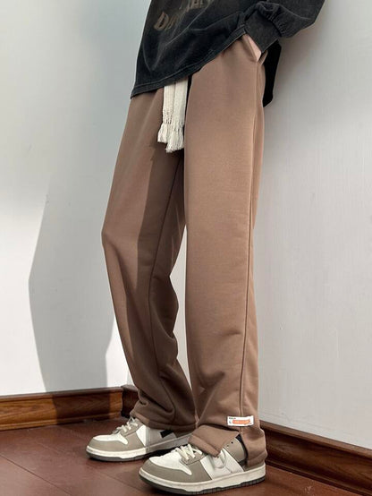 Brown essential straight fit track pants with clean minimal look, premium breathable all-season fabric by BombyyClothing