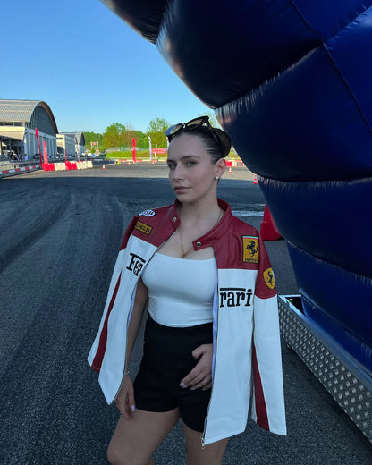 Classic Ferrari red white leather jacket with stitched branding and premium fitted silhouette for streetwear lovers.

Luxury Ferrari vintage leather racing jacket with bold dual-color design and high-quality craftsmanship