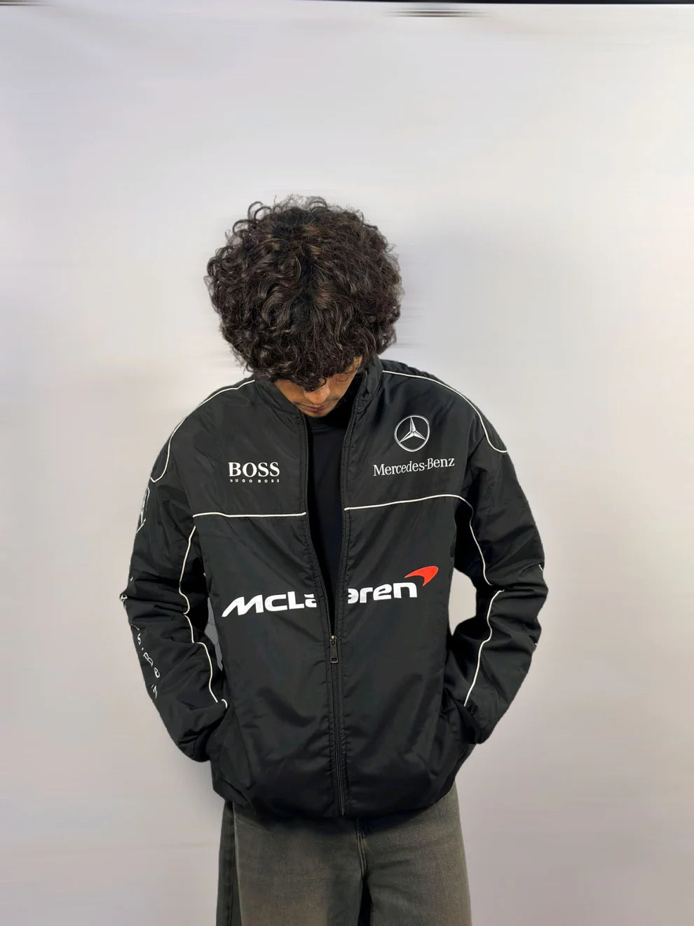 Mercedes McLaren F1 vintage parachute puffer jacket with racing-inspired design and lightweight insulated fabric